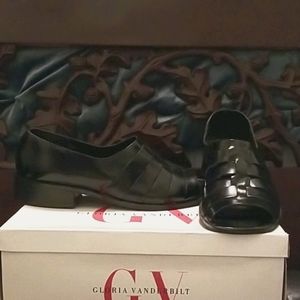 Black open-toe slip-on shoes